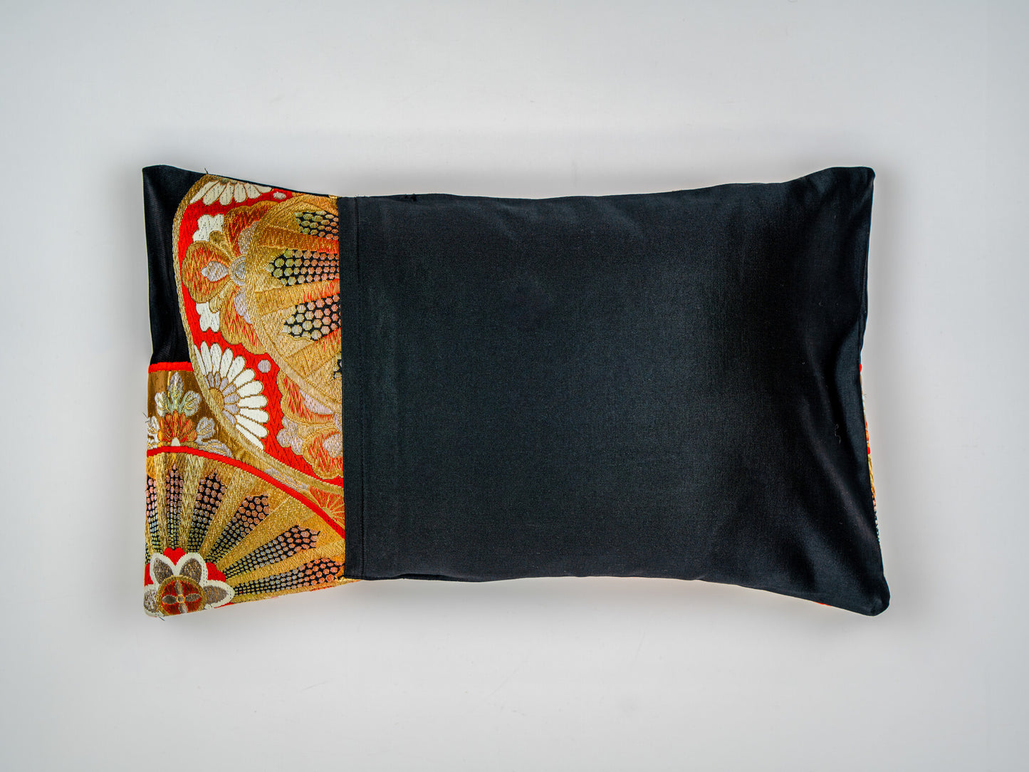 The Miyako Noir — Japanese Silk Lumbar Pillow, Black Gold Genji Wheel Imperial Chrysanthemum Obi