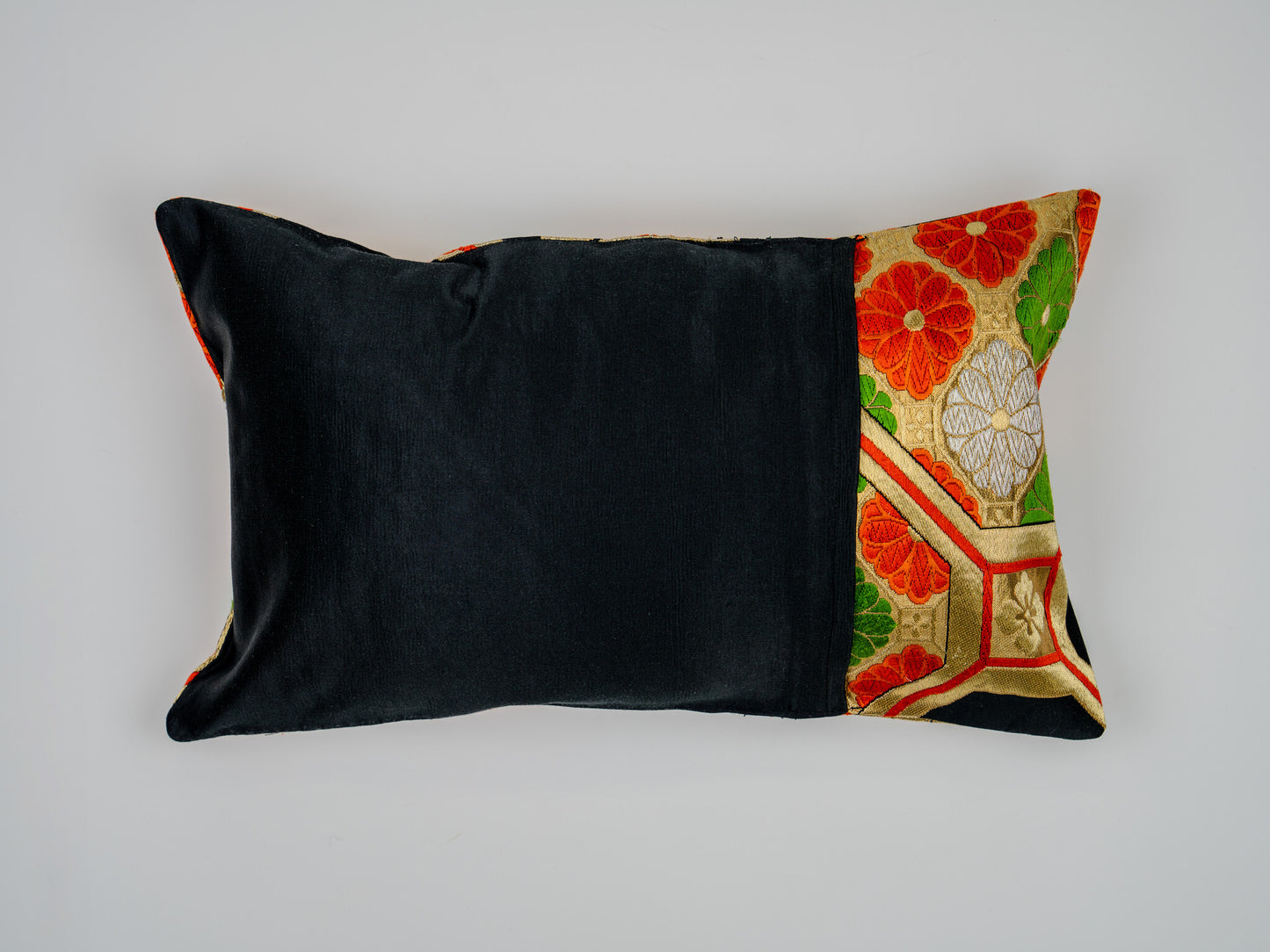 Japanese ceremonial silk lumbar pillow with kiri paulownia crest in black and gold — Renaras atelier