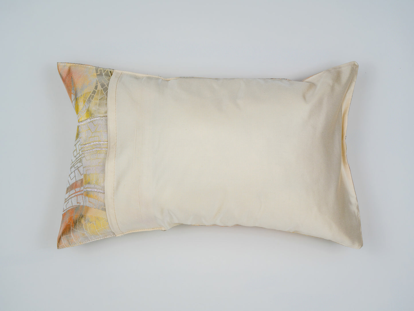 Japanese ceremonial silk lumbar pillow with raden wave motif in champagne and silver — Renaras atelier