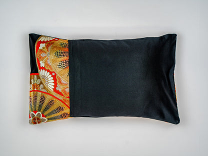 Japanese ceremonial silk lumbar pillow with genji-guruma carriage wheel in black and gold — Renaras atelier