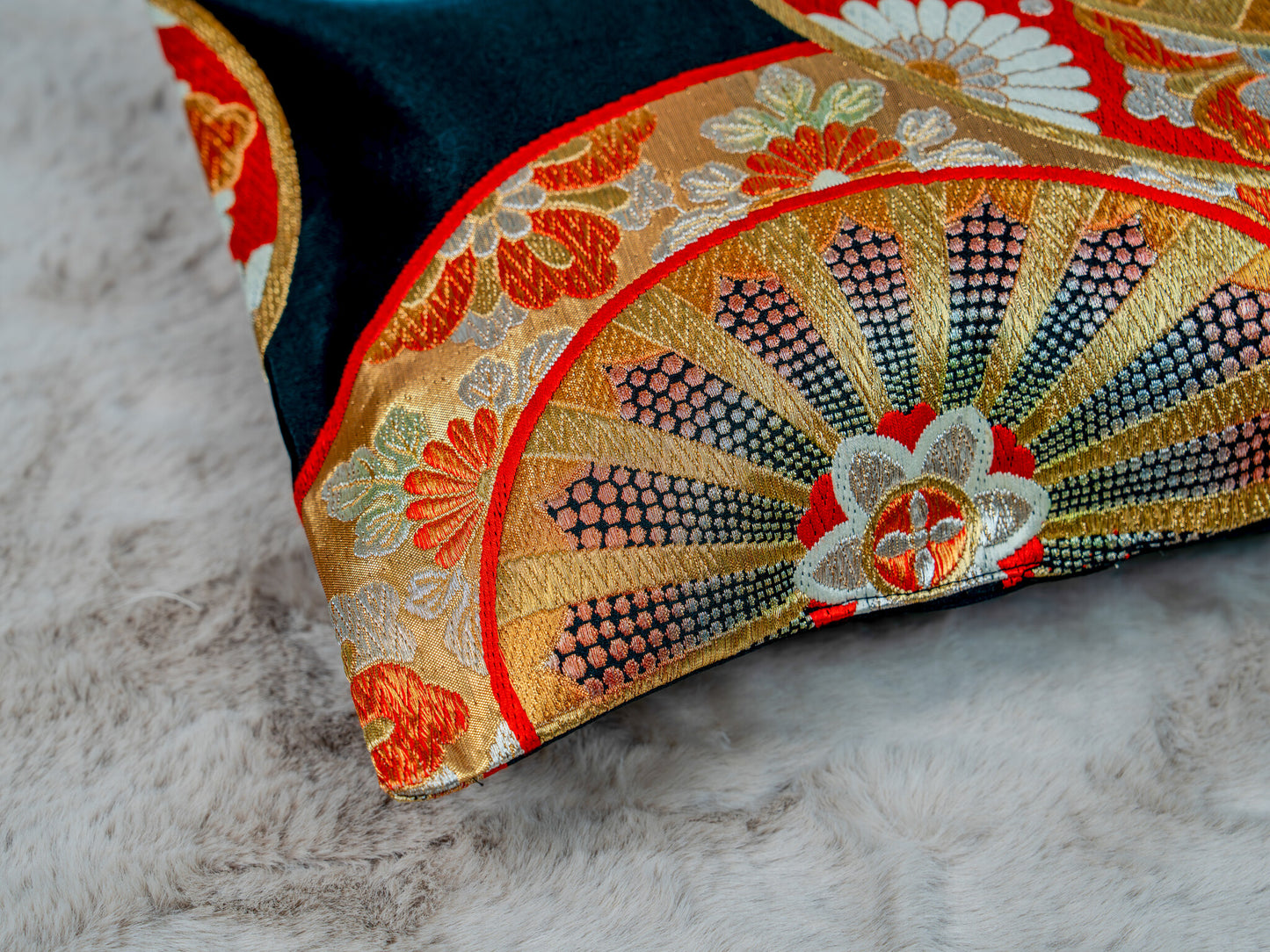 Japanese ceremonial silk lumbar pillow with genji-guruma carriage wheel in black and gold — Renaras atelier