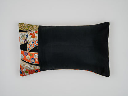 Japanese ceremonial silk lumbar pillow with tabane-noshi knot in black and gold — Renaras atelier