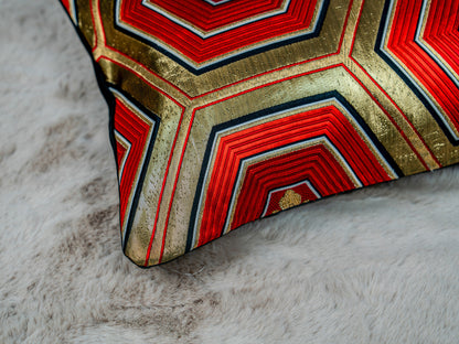 Japanese ceremonial silk lumbar pillow with kikkō hexagon in black, red and gold — Renaras atelier