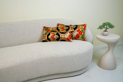 Japanese ceremonial silk lumbar pillow with kiri paulownia crest in black and gold — Renaras atelier