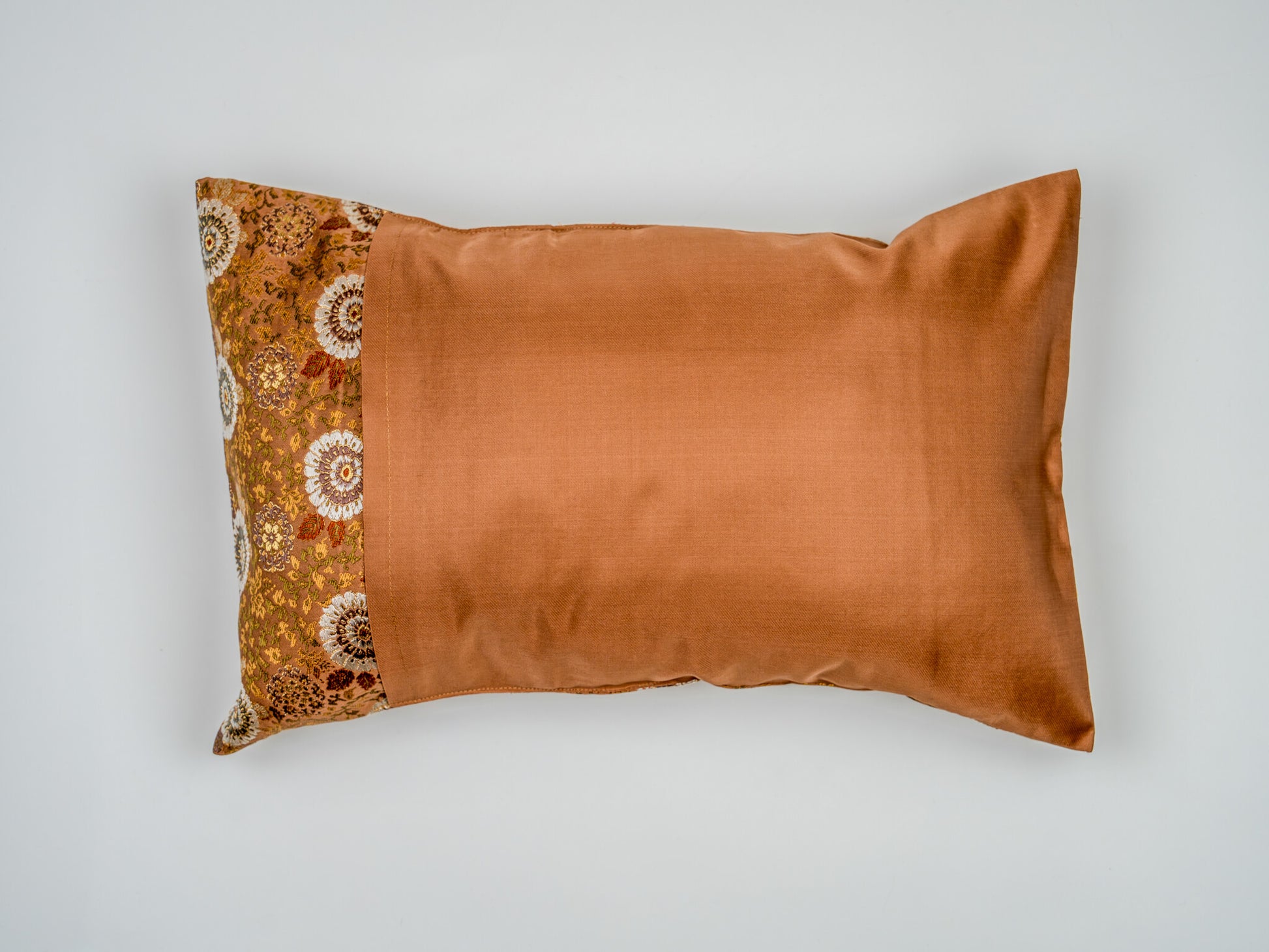 Japanese ceremonial silk lumbar pillow with kiku chrysanthemum in copper and pearl — Renaras atelier