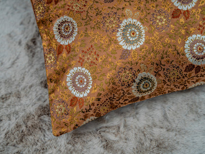Japanese ceremonial silk lumbar pillow with kiku chrysanthemum in copper and pearl — Renaras atelier