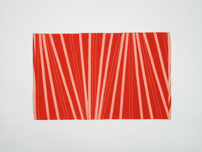 Japanese ceremonial silk placemat with sunburst rays in coral and crimson — Renaras atelier