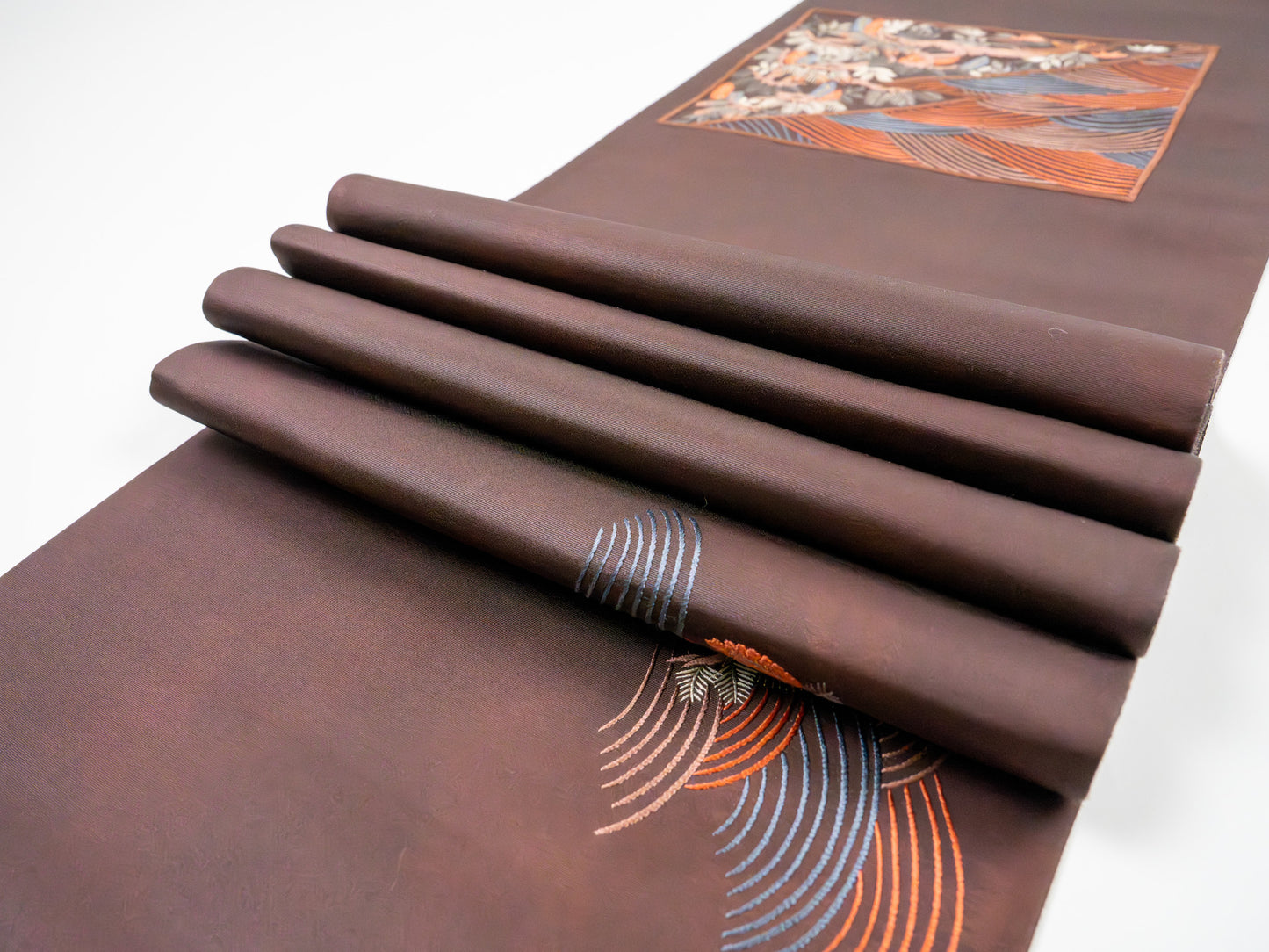 Japanese ceremonial silk table runner with seigaiha and matsu in deep plum — Renaras atelier
