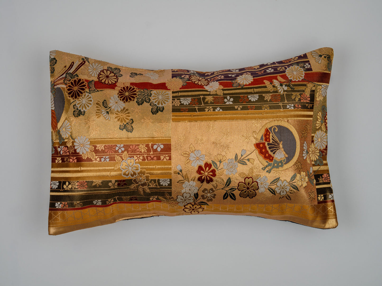 Japanese ceremonial silk lumbar pillow with hōō phoenix, butterfly and chrysanthemum motif in gold and crimson — Renaras atelier