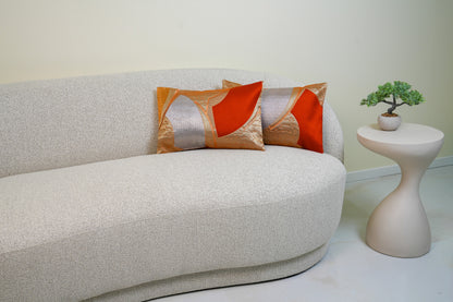 Japanese ceremonial silk lumbar pillow with herringbone chevron in persimmon and silver — Renaras atelier