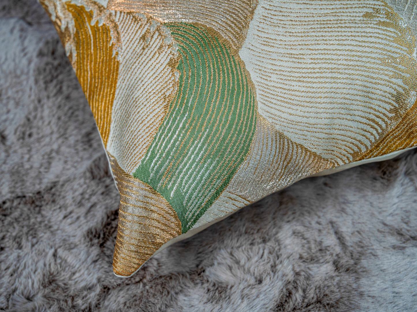 Japanese ceremonial silk lumbar pillow with wave motif in muted green and gold — Renaras atelier