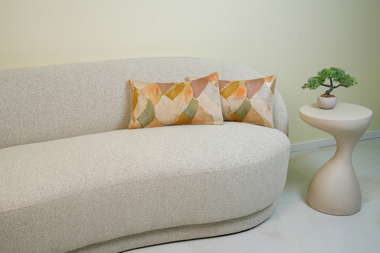 Japanese ceremonial silk lumbar pillow with seigaiha wave motif in gold and sage — Renaras atelier