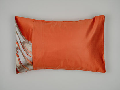 Japanese ceremonial silk lumbar pillow with ryūsui flowing water in persimmon and silver — Renaras atelier