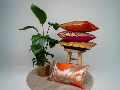 Japanese ceremonial silk lumbar pillow with ryūsui flowing water in persimmon and silver — Renaras atelier