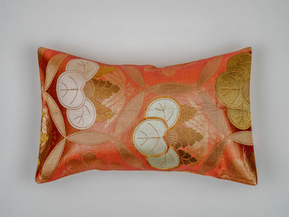 Japanese ceremonial silk lumbar pillow with aoi crest in persimmon and gold — Renaras atelier