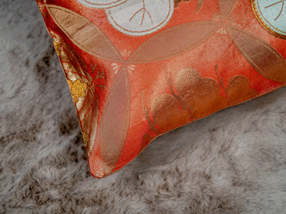Japanese ceremonial silk lumbar pillow with aoi crest in persimmon and gold — Renaras atelier