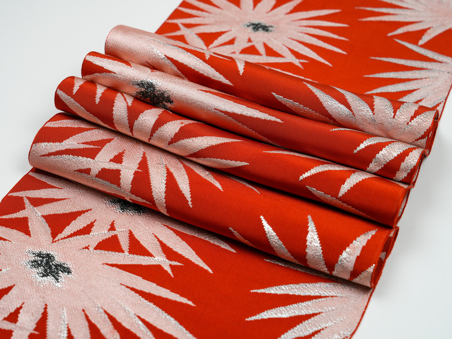 Japanese ceremonial silk table runner with starburst in vermilion and silver — Renaras atelier