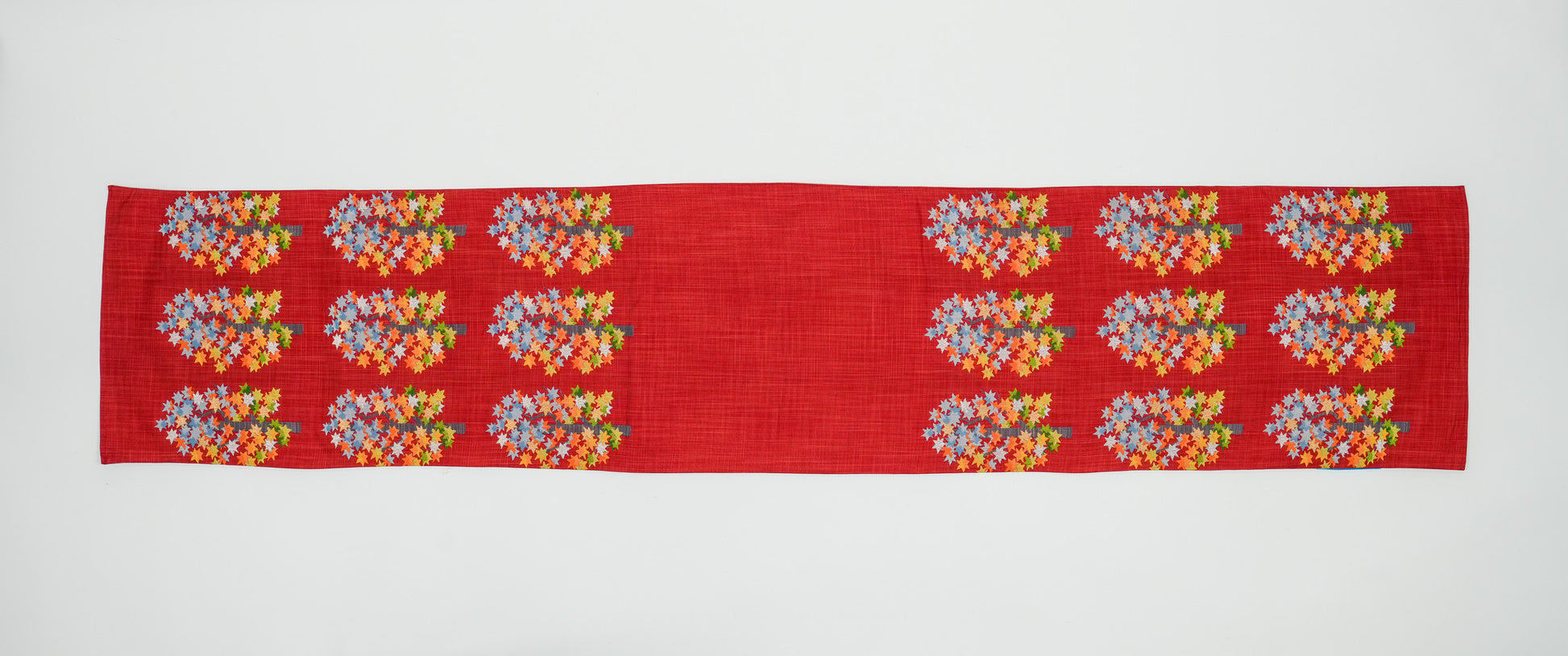 Japanese ceremonial silk table runner with momiji maple forest in crimson and multicolour — Renaras atelier