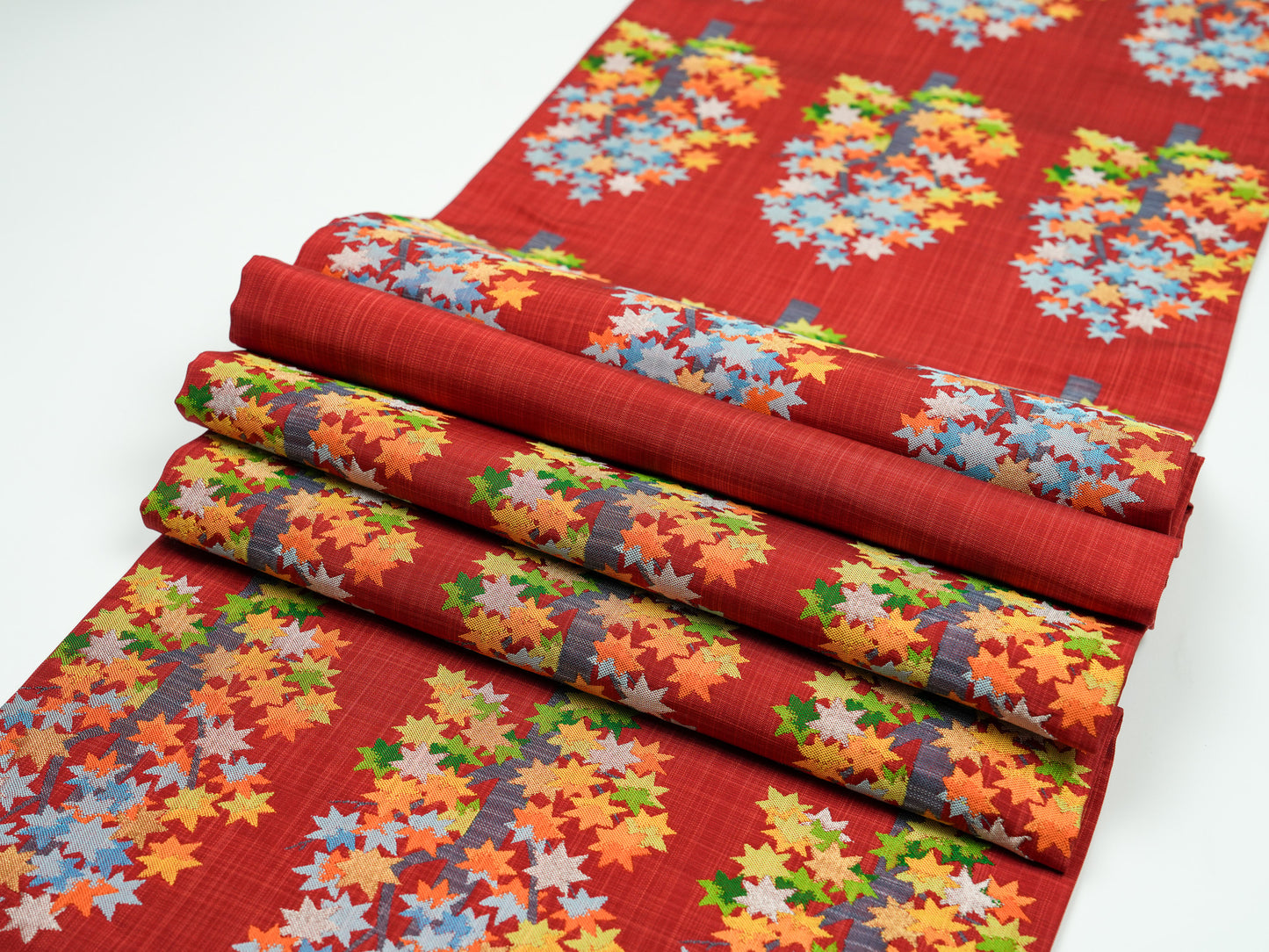 Japanese ceremonial silk table runner with momiji maple forest in crimson and multicolour — Renaras atelier