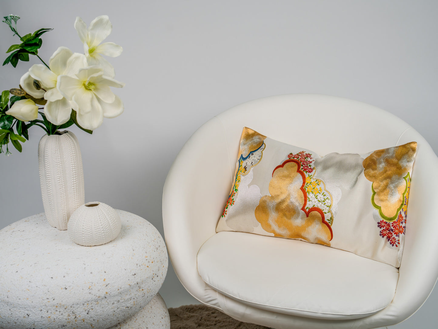 Japanese ceremonial silk lumbar pillow with zuiun auspicious cloud motif in white and gold — Renaras atelier