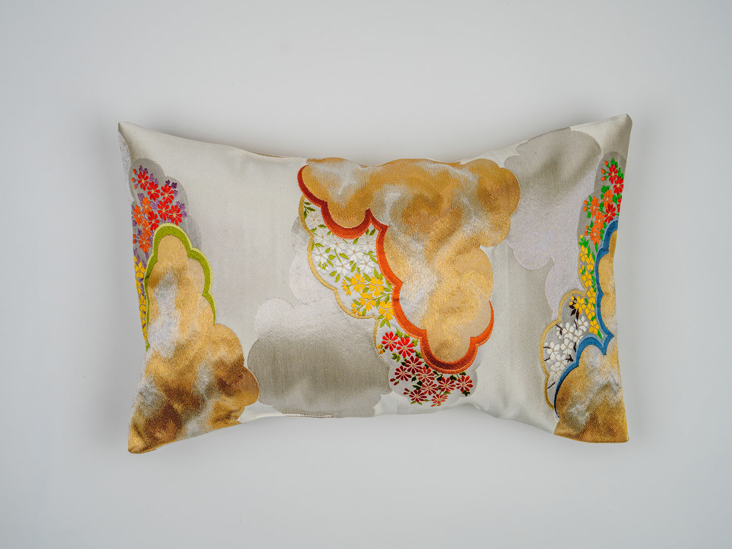 Japanese ceremonial silk lumbar pillow with zuiun auspicious cloud motif in white and gold — Renaras atelier
