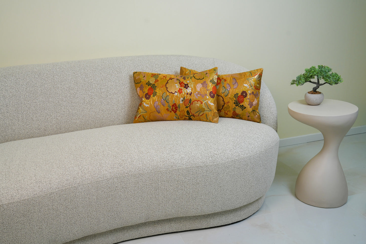 Japanese ceremonial silk lumbar pillow with kiku and autumn florals in gold — Renaras atelier
