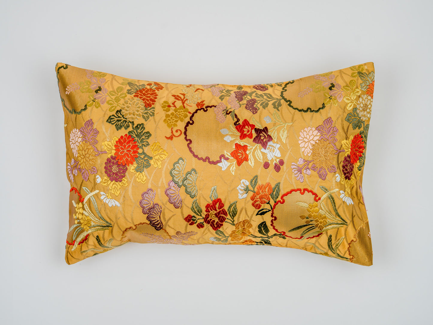 Japanese ceremonial silk lumbar pillow with kiku and autumn florals in gold — Renaras atelier