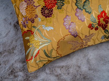 Japanese ceremonial silk lumbar pillow with kiku and autumn florals in gold — Renaras atelier