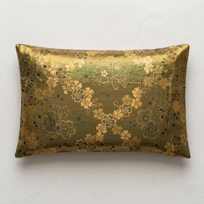 Japanese ceremonial silk lumbar pillow with bokashi gradient green to madder red and chrysanthemum motif — Renaras atelier