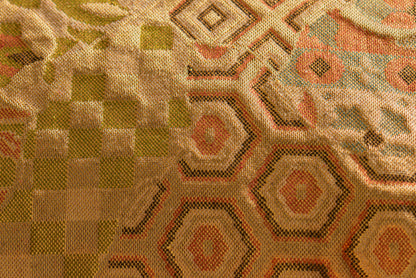 Japanese ceremonial silk lumbar pillow with kikkō hexagons and ichimatsu checkerboard in gold and sage — Renaras atelier