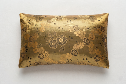 Japanese ceremonial silk lumbar pillow with bokashi gradient green to madder red and chrysanthemum motif — Renaras atelier