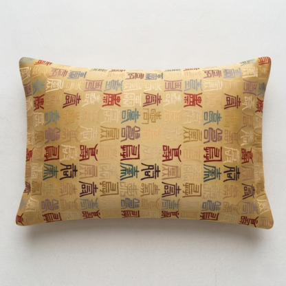 Japanese ceremonial silk lumbar pillow with tenshō seal script in gold and multicolour — Renaras atelier