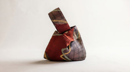 Japanese Ceremonial Silk Knot Bag – The Inazuma, Diagonal Lines on Patchwork in Oxblood and Gold