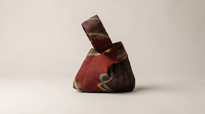 Japanese Ceremonial Silk Knot Bag – The Inazuma, Diagonal Lines on Patchwork in Oxblood and Gold