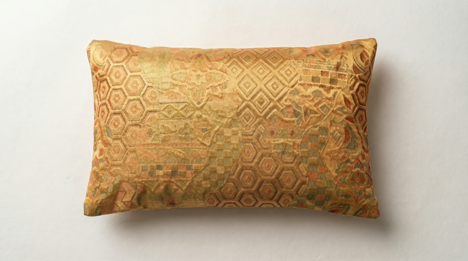 Japanese ceremonial silk lumbar pillow with kikkō hexagons and ichimatsu checkerboard in gold and sage — Renaras atelier