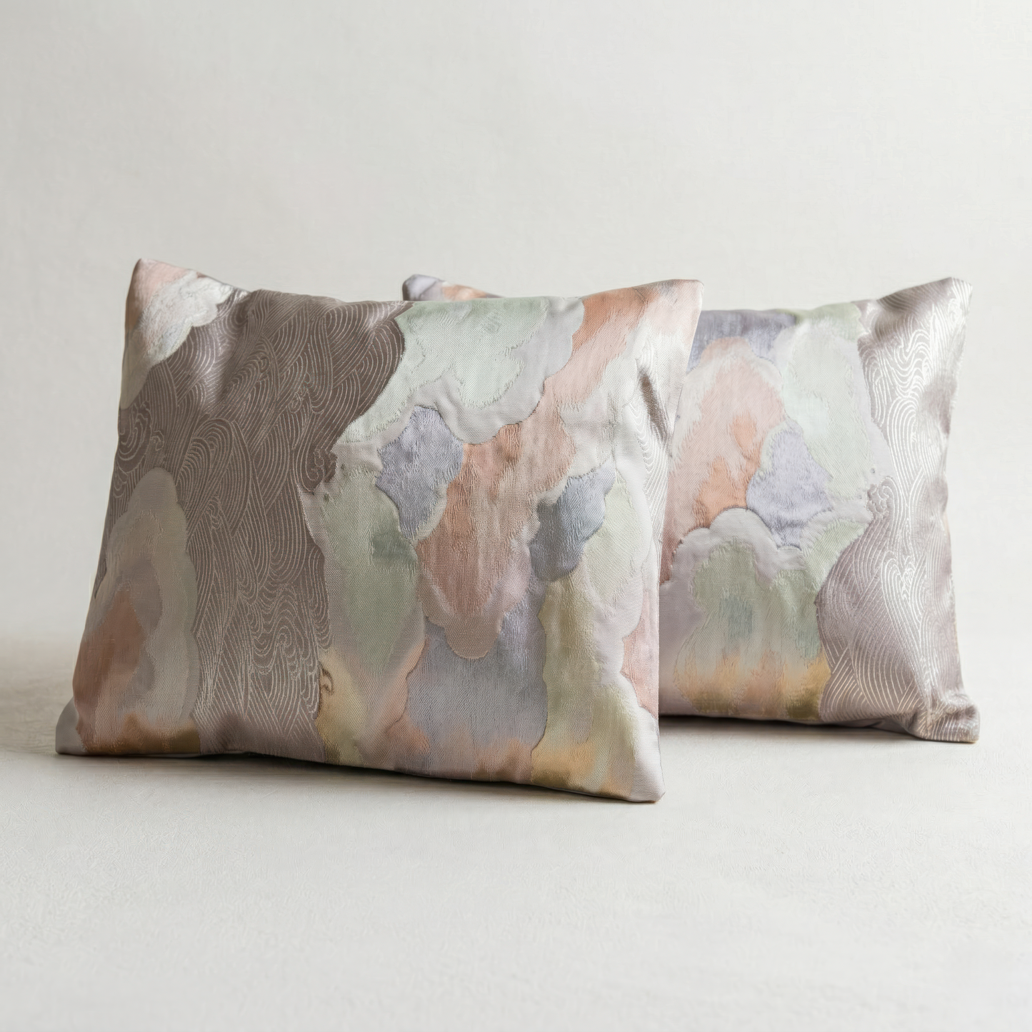 Japanese ceremonial silk lumbar pillow with kumo no niwa cloud garden motif in coral and gold — Renaras atelier